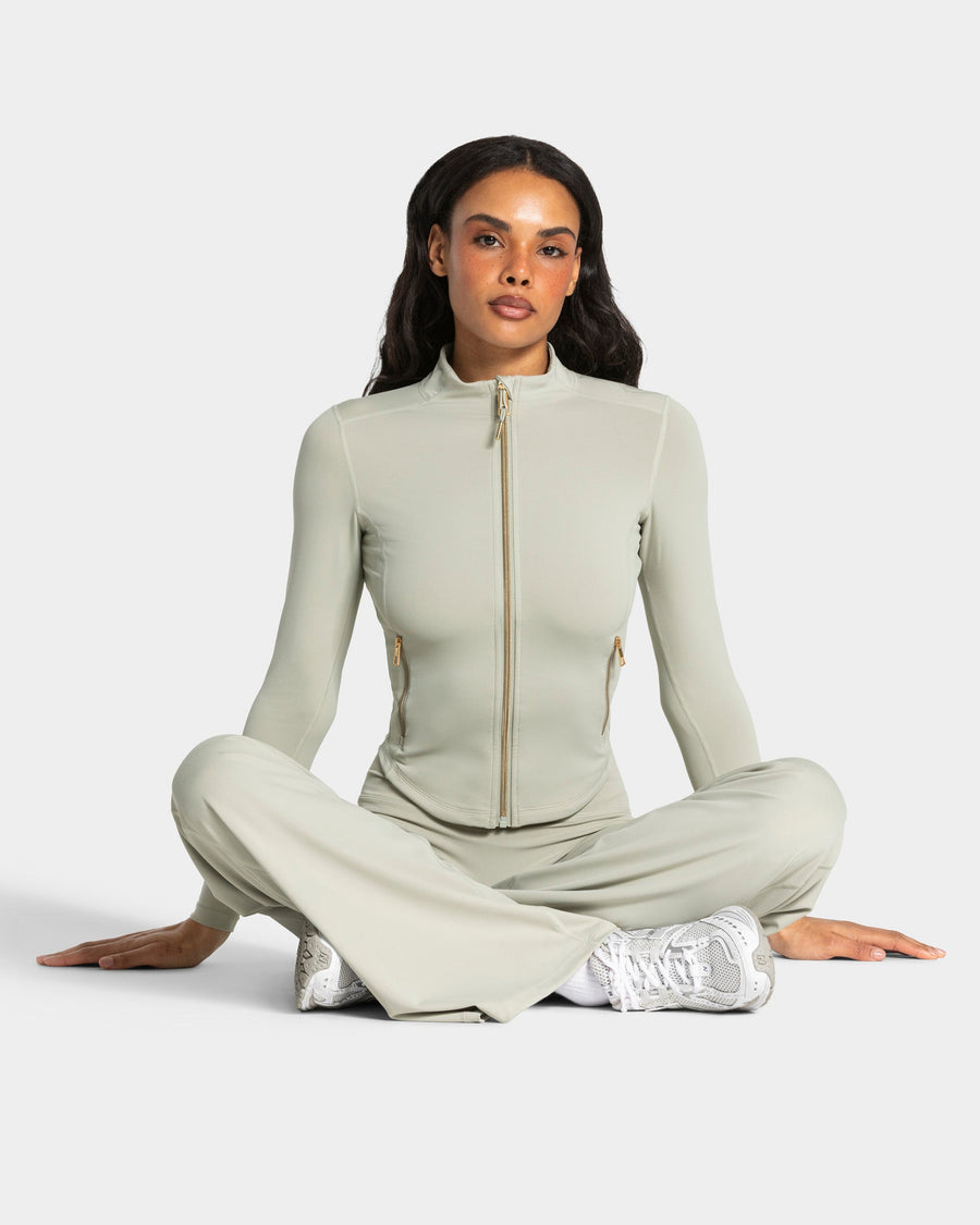 Veste de sport zippée sculptante Allrounder « pistache/dorée »