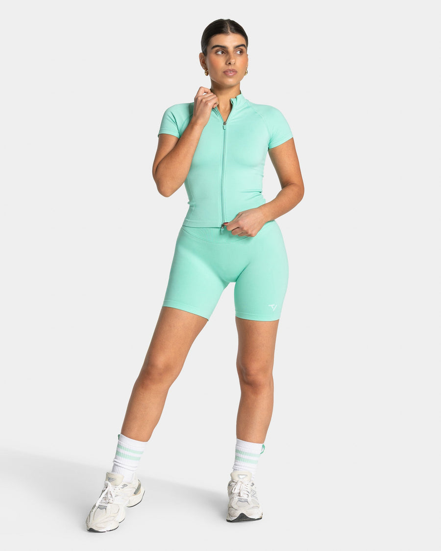 Haut à manches courtes zippé Lift « menthe"